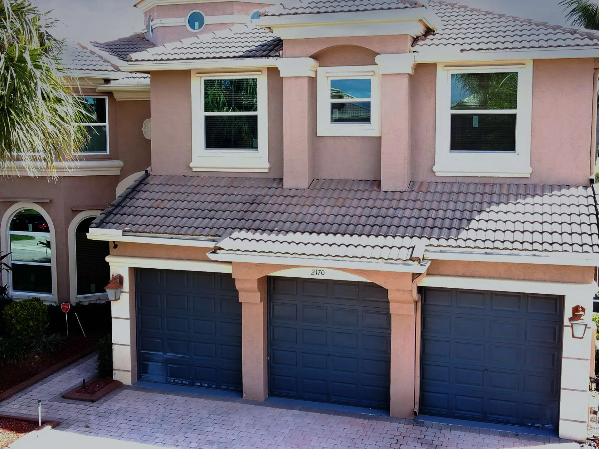 Florida home with triple garage and new impact windows installed